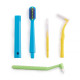 Orthodontic set for care of braces with a monobundle brush, light green